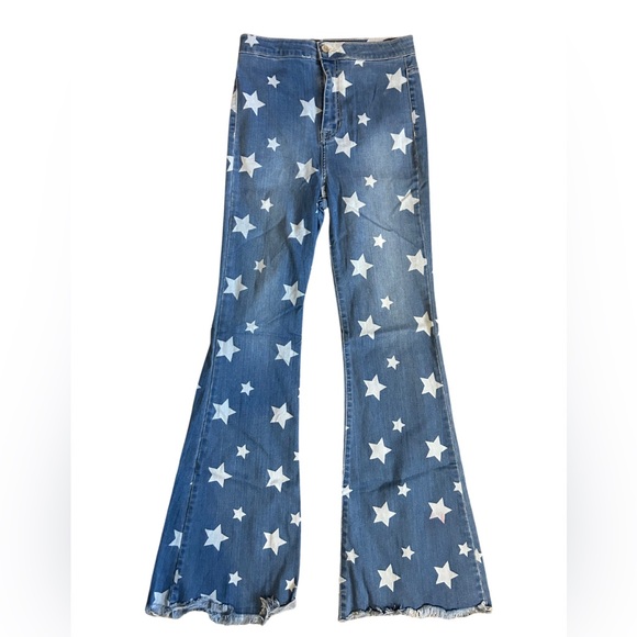 Bell bottom jeans with stars all over - Picture 1 of 1